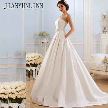 En Linje Wedding Kjoler 2023 Vintage Lommer Bue Kina Vestidos De Novia Ryggløse Pluss Størrelse Knappen Brude Gowns Bruden